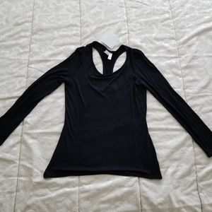 NWT Stella Cruz Activewear. L/S top Size L.